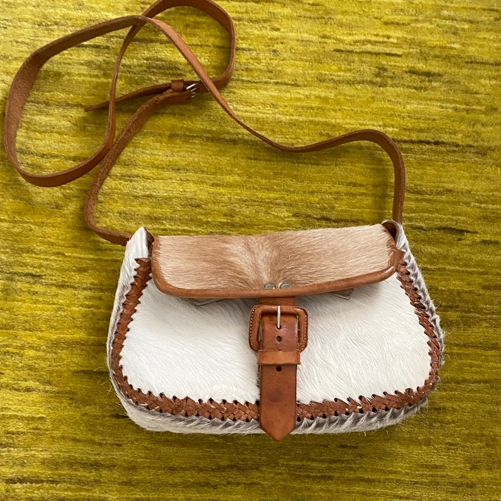 In excellent condition leather & cowhide Tan 
And cream crossbody/ shoulder Bag